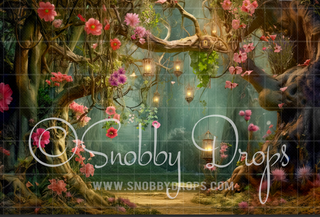 Enchanted forest backdrop with pink blossoms, hanging lanterns, and glowing archway of trees.